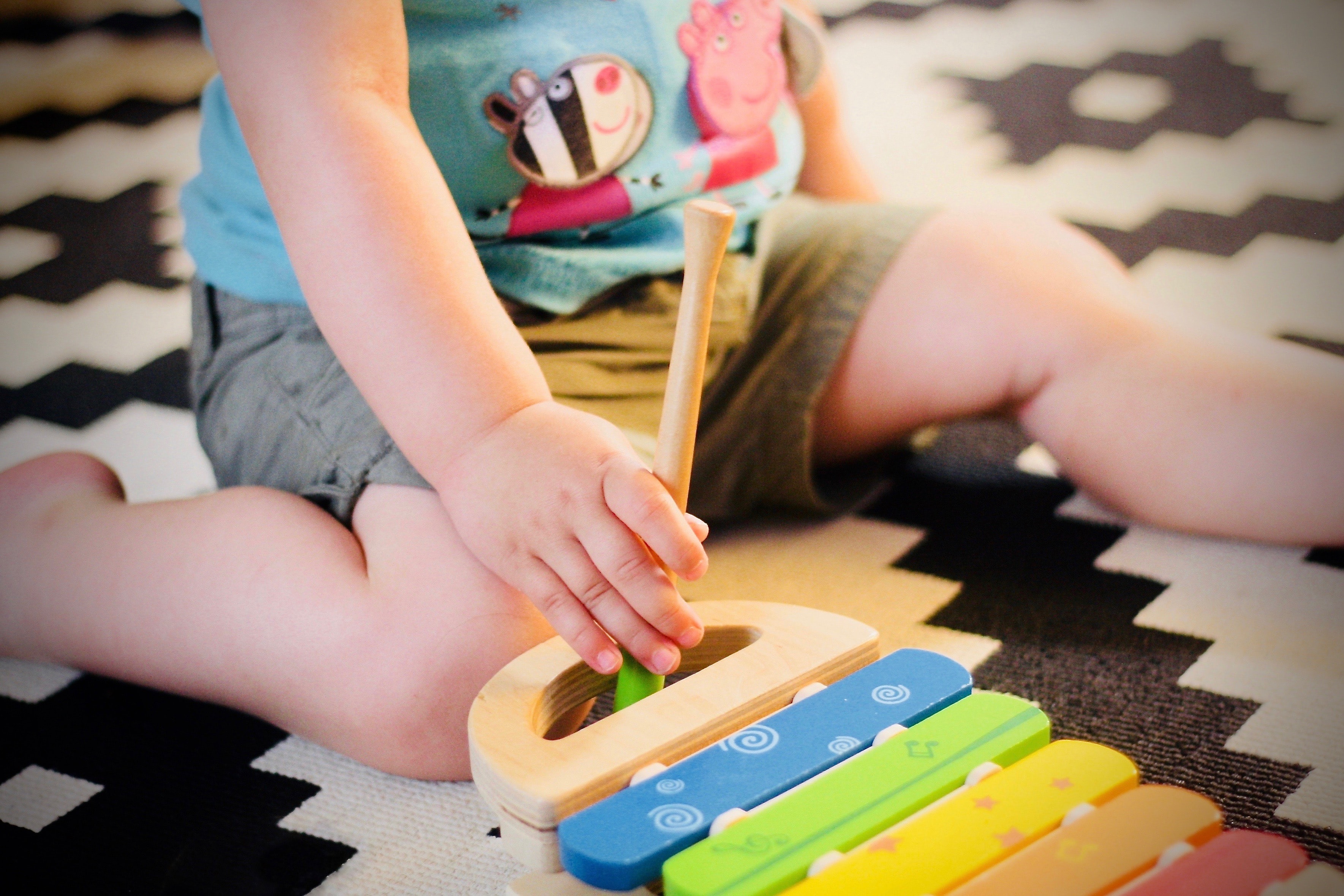 Baby playing colored Xylophone. 