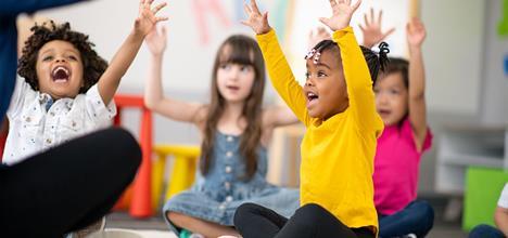 children sitting during story time